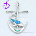 Man-made opal dolphin shape pendant in 925 silver